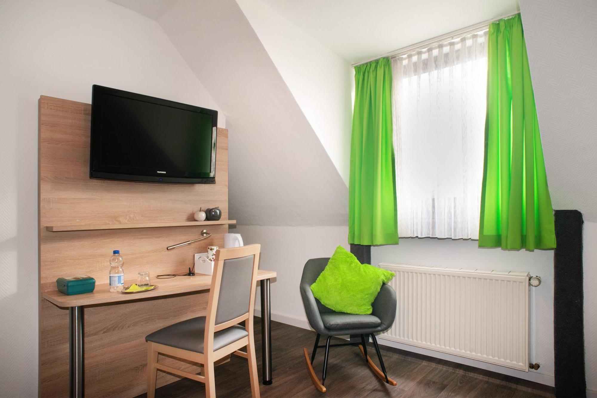 Hotel Garni Haus Schoenberger Heiligenhaus Quarto foto
