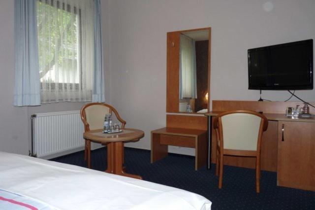 Hotel Garni Haus Schoenberger Heiligenhaus Quarto foto